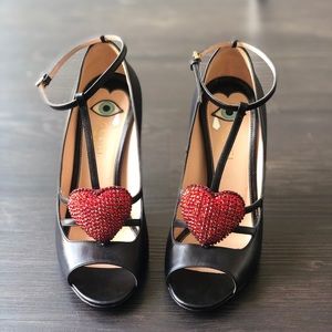 Gucci open toe shoes.